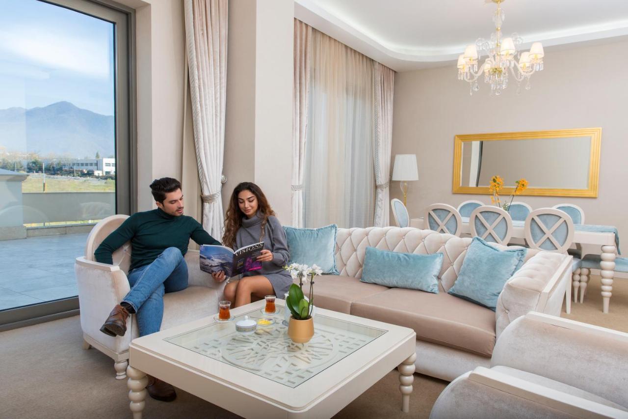 Gabala Garden Hotel Εξωτερικό φωτογραφία A living room in a hotel suite